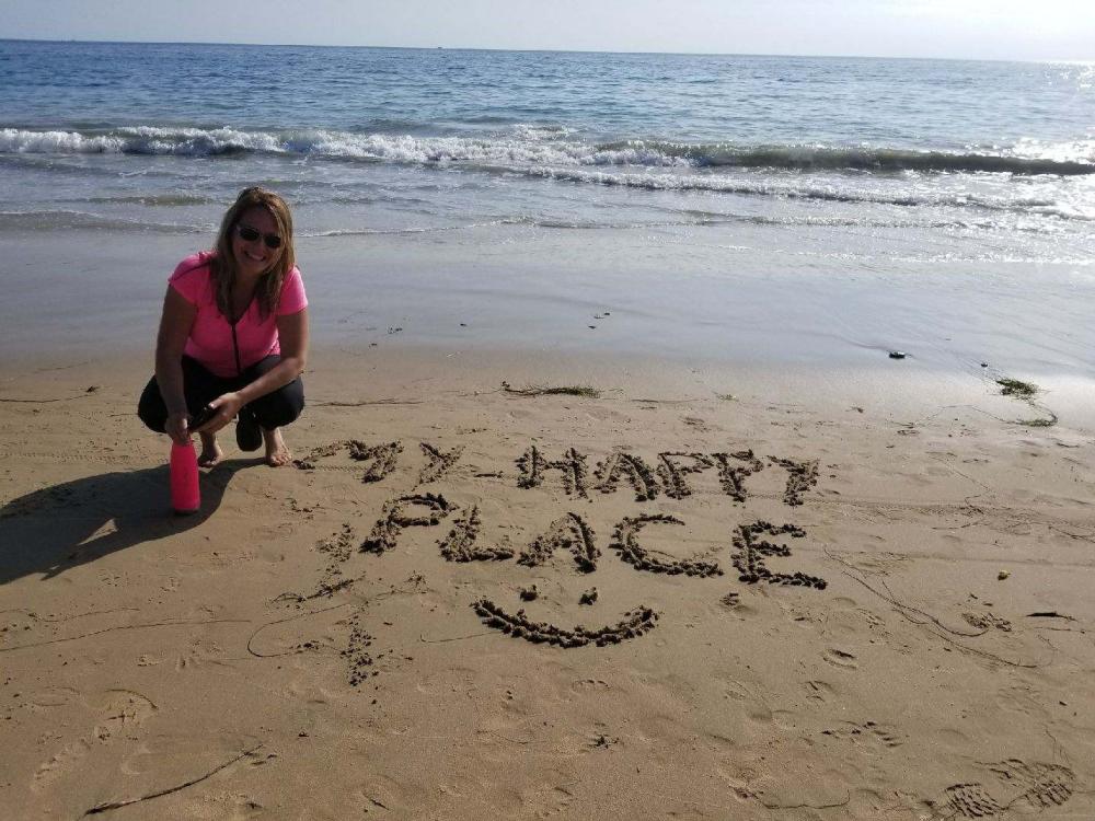 loreen beach my happy place written in sand