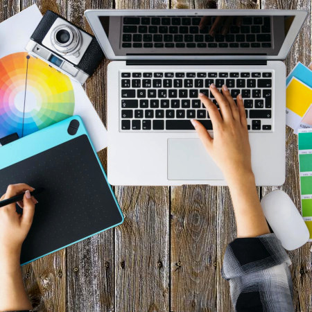 laptop and sketch pad